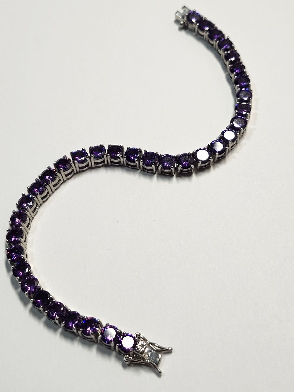 Sterling Silver Plated Tennis Bracelet With Vibrant Purple CZ Stones 7"
